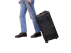 Person walking and rolling the Flight Case